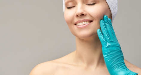 female squeezes cellulite skin her legs close up shot white space 1 2